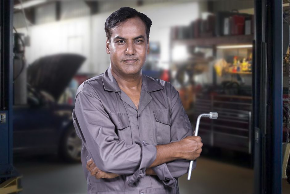 Smiling auto glass professional